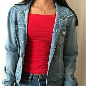 Super cute jean jacket with pockets.